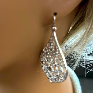 Lightweight detailed silver earrings.
